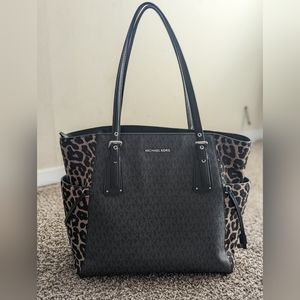 MK cheetah purse